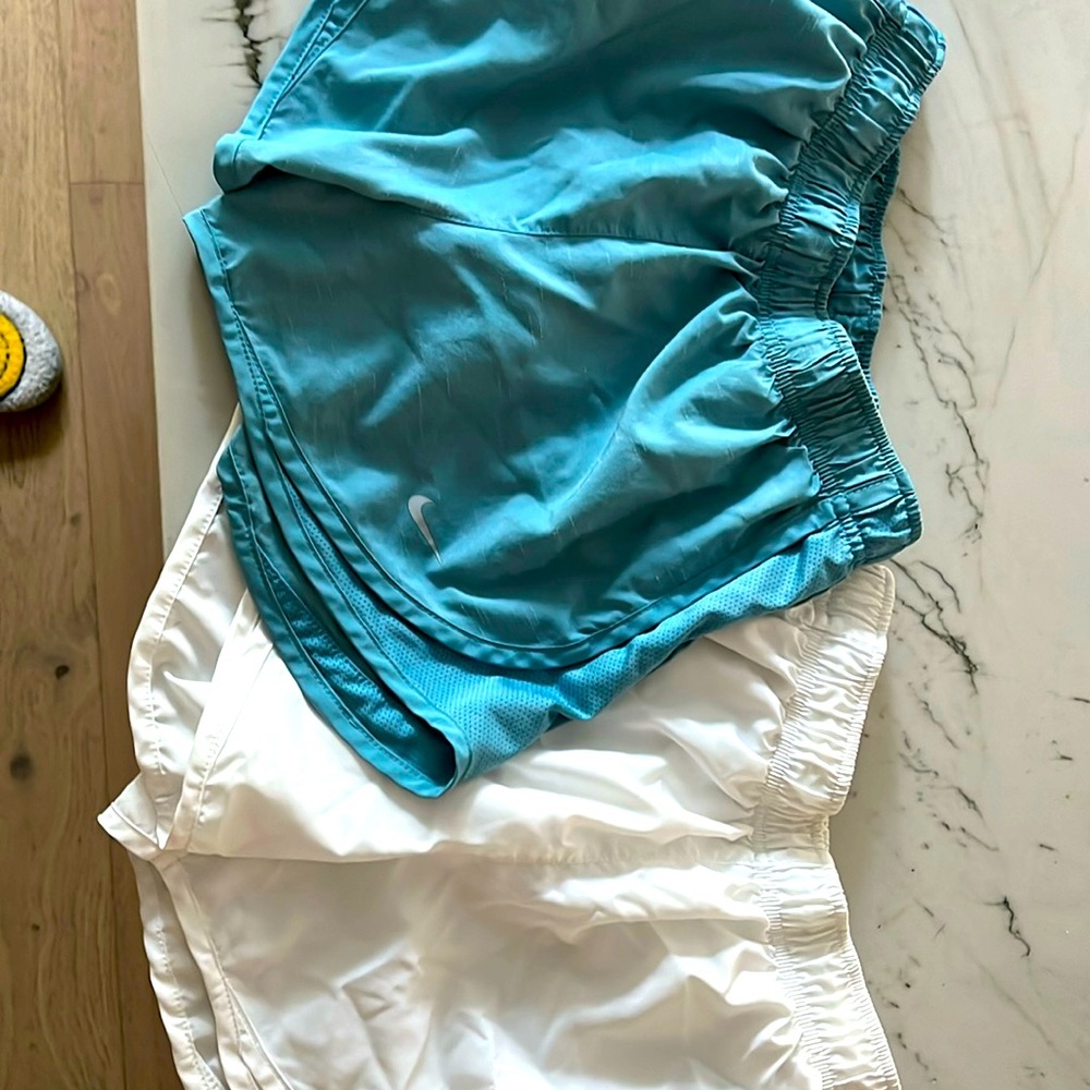 2 pairs of xs dri-fit Nike shorts